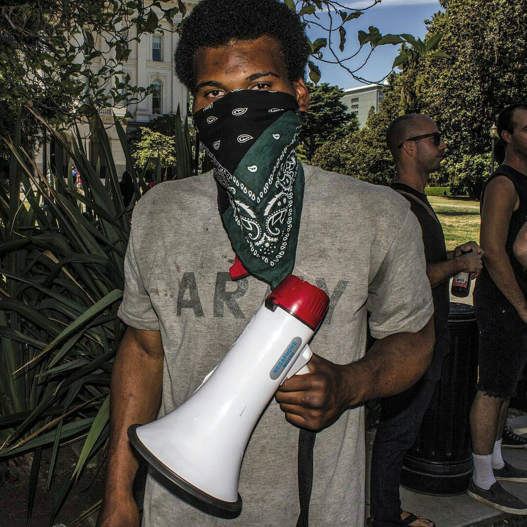 Repost from Karlos: This is Vincent. He randomly asked me to take his photo and afterwards we hung out for a while. Vincent is funny, passionate, and a good dude. He was stabbed six times by a Nazi protestor. It isn't known if he'll make it. Please support him and others who were wounded by donating to the medical fund: https://rally.org/June26th