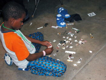 Boy Working on Puzzle